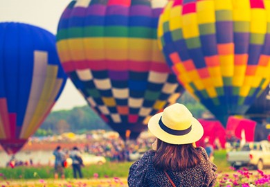 Tourist Traveling into Balloon Festival