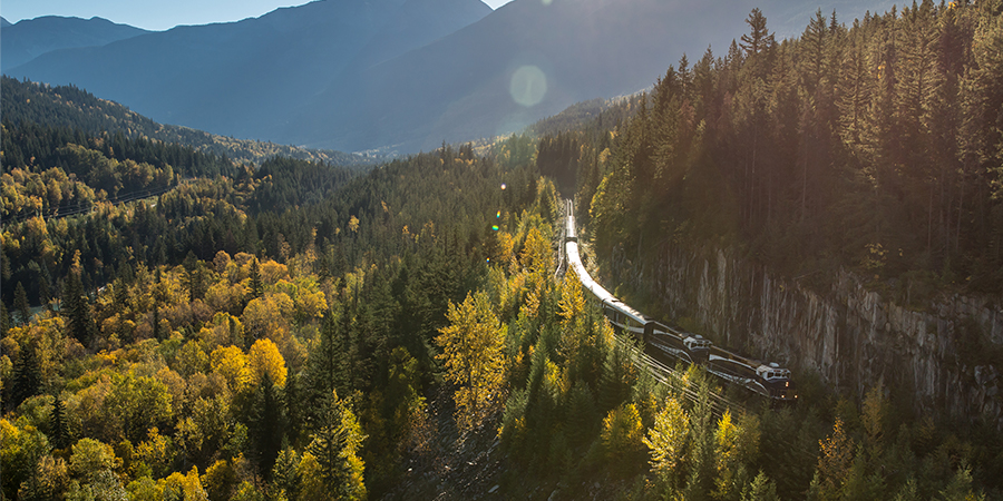 Rocky Mountaineer Travelling On Journey Through The Clouds 