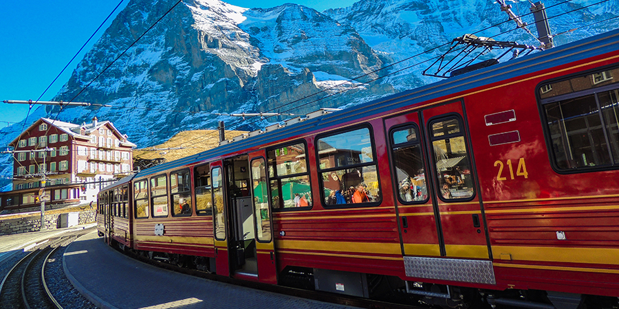 Class red train leads up to Jungfraujoch