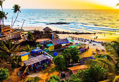 Sunset On Palm Beach On The Pacific Ocean Goa India
