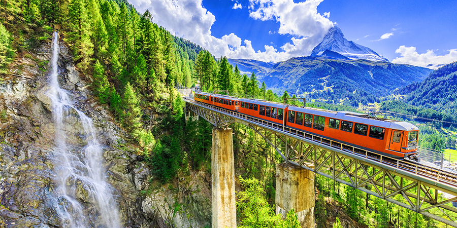 Gornergrat Tourist Train With Waterfall 