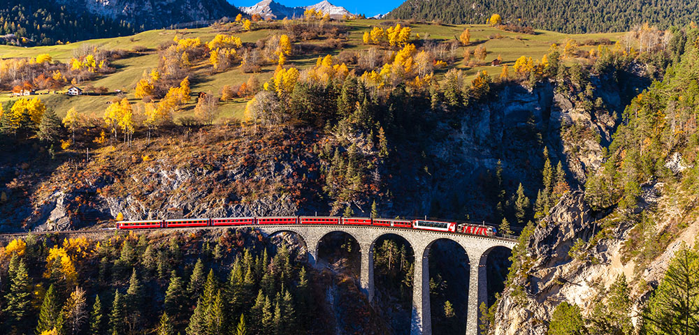 Rhaetian Railway Running On The Famous Landwasser Viaduct