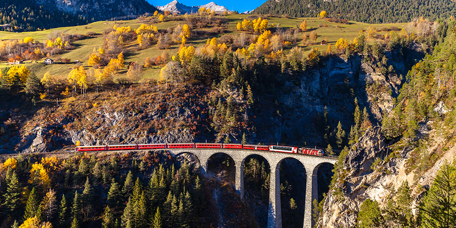 Rhaetian Railway Running On The Famous Landwasser Viaduct