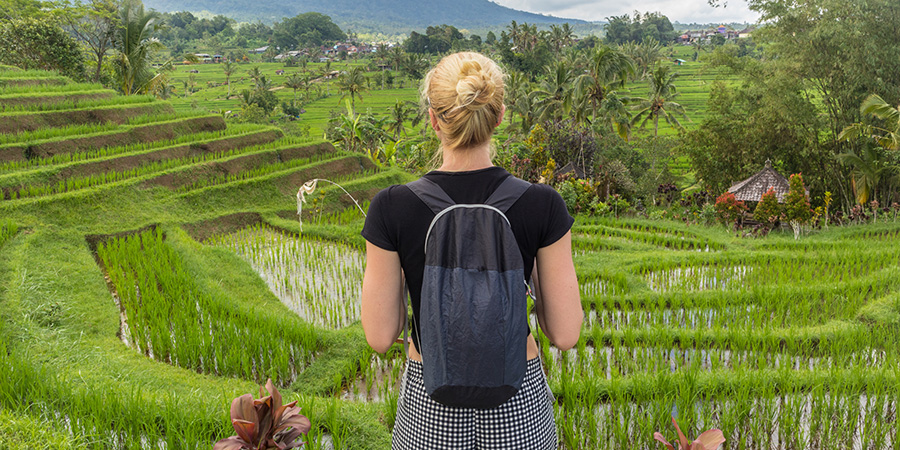 Casual Caucasian Female Tourist Wearing Small Backpack