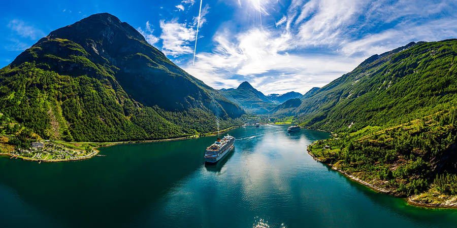 Cruise across the peaceful waters of Geirangerfjord
