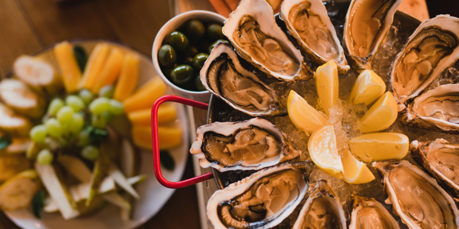 Shuck fresh oysters at the Maine Oyster Company